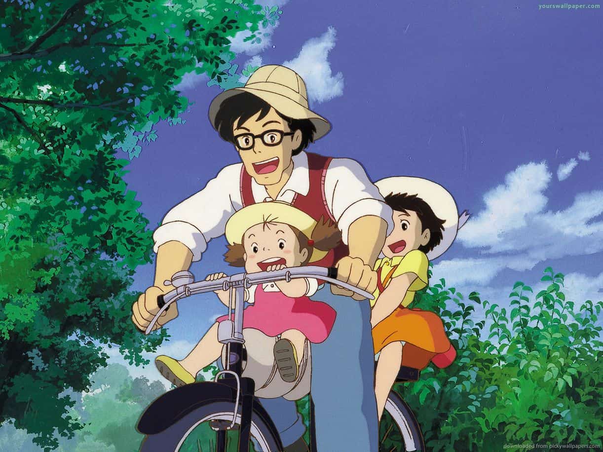A father rides with his young daughters in My Neighbour Totoro