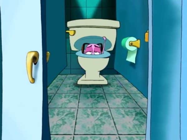 Here's Courage hiding in a toilet. Courage is often hiding inside things in this series.