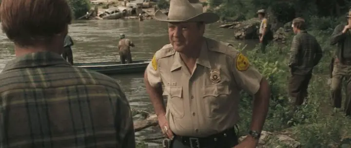 The author of the novel played the police sheriff in the film. Because he is not an actor, the director basically had him playing himself.