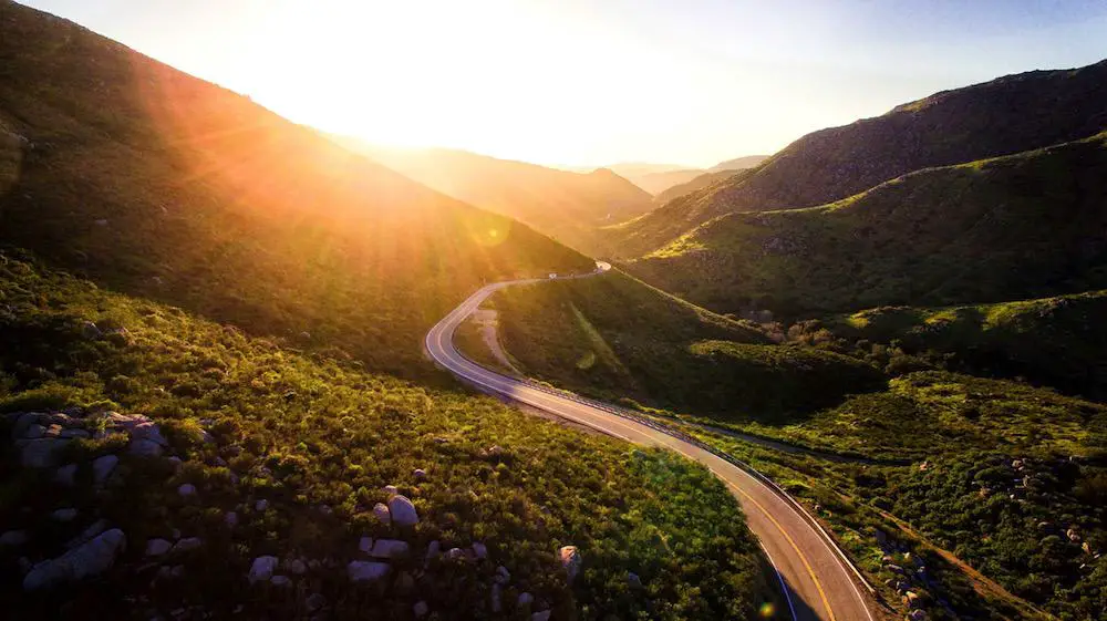 rolling hills with sunset