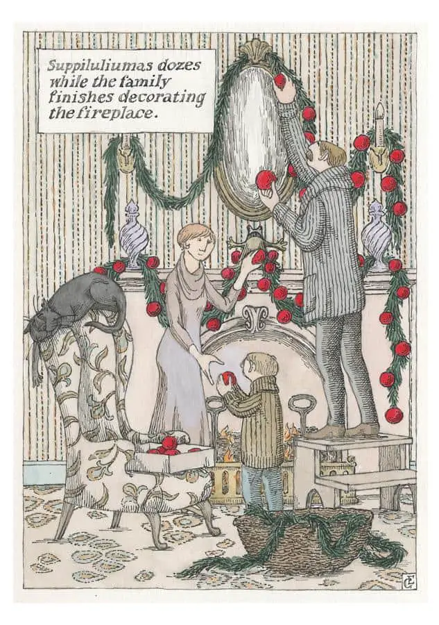 Edward Gorey decorating fireplace