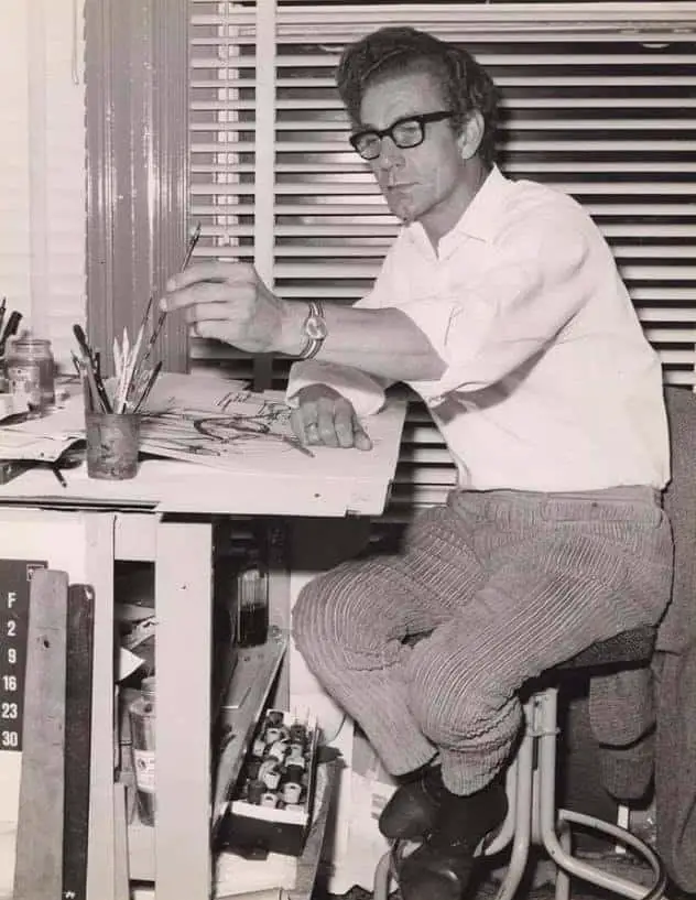Illustrator Charles Keeping at work at his desk