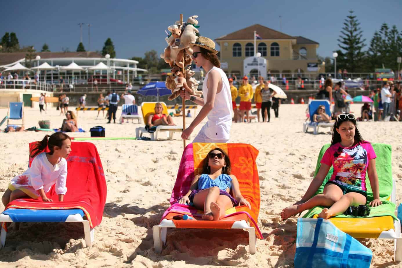 Modern Family girls sunbathing at Bondi Beach